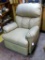 Nice recliner is in good condition with no tears noted. Reclines and rocks as it should. Comfortable