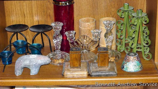 Candle holders up to 9-3/4" tall. Some are glass, some wood, some metal. Nice assortment.