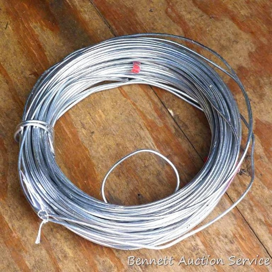 Roll of heavy gauge aluminum wire is dead soft annealed. Roll is approx. 10" diameter.