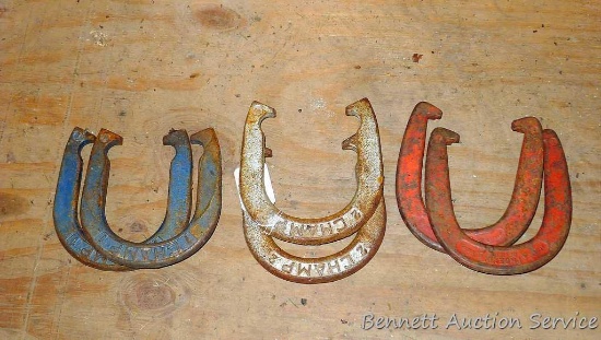 Four Champion throwing horses shoes; plus a pair of Phoenix throwing shoes;