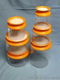 Vintage Tupperware canister set includes five canisters with lids. All look to be in good shape.
