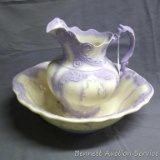 Pretty purple accented pitcher and bowl in good condition. Pitcher stands 11