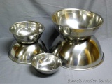 Nesting stainless steel mixing bowl set in good shape. Largest bowl is 13