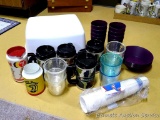 Nice deep plastic dishpan filled with travel mugs, plastic cups, tumblers and bowls and more. Great