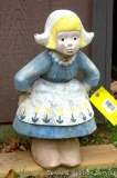 Dutch girl yard figurine stands about 18