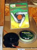 Twin filament weed trimmer bump head appears new; NIP weed terminator trimmer head; partial roll