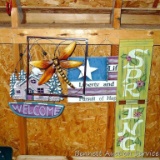 Dragonfly, cabin, flag and Spring outdoor wall hangings. Larges is the Spring plaque at 32