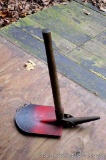 Folding shovel with pick stands about 18