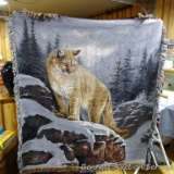 Nice woven blanket with mountain lion design measures approx. 27