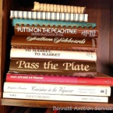 Cook books including Puttin' on the Peachtree, Southern Sideboards, Pass the Plate, To Market To
