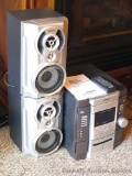 Sony stereo Model MHC-GX20 with speakers, 3 disc changer, double tape deck, radio tuner, remote.