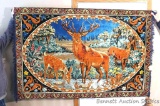 Deer tapestry is approx. 6' x 4' and is in good condition.