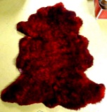 Dyed sheepskin rug measures approx. 52