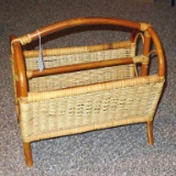 Wicker or rattan magazine basket is sturdy and in good shape. Measures approx. 17