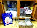 Vases, clear pressed glass plates and bowls, cling wrap, wire organizer shelves, baskets, more