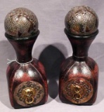 Pair of Italian leather feel decanters with glass ball closures. Approx. 11