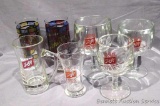 Six assorted Schlitz beer glasses, plus one Schaefer's glass.