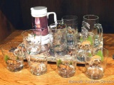 Two duck trays, wildlife glasses, stein and mugs.