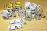 Assorted Green Bay Packers cups, mugs and a shot glass; plus commemorative $4 Green Bay Packer