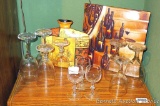 Assorted wine glasses and decorations. Print is 12