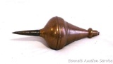 Remarkable brass and iron plumb bob is eight inches tall. Threads on string holder are free and