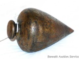 Antique cast iron plumb bob retains some of its original paint and is 4-1/4