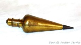 Five inch General Hardware brass plumb bob body is numbered S 120Z. String cap is No. 800 and is