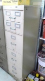 Nice sturdy five drawer file cabinet is in good condition and measures 52