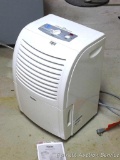 Haier dehumidifier with manual appears in very good condition.