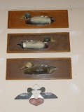 Decorative duck plaques, plus loon wall hanging. Duck plaques each measure 8-1/2