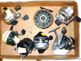 Shakespeare Alpha 2528g fly reel; six other reels by Diawa, Zebco, and Johnson.