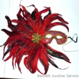 Beautiful feathered masquerade ball mask measures approx. 18