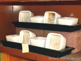 Two trays with four pots each - great for small indoor rock or succulent garden. Trays measure 16
