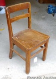 Antique wooden child's chair is sturdy and in good condition. Stands 25-1/2