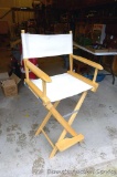 Director's chair is stool height and in overall good condition. Stands 44