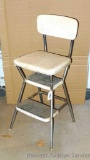 Vintage Cosco kitchen step stool is sturdy and in overall good condition.