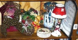 Winter and/or Christmas decorations - red snowflake lantern, reindeer made of bells, pinecone
