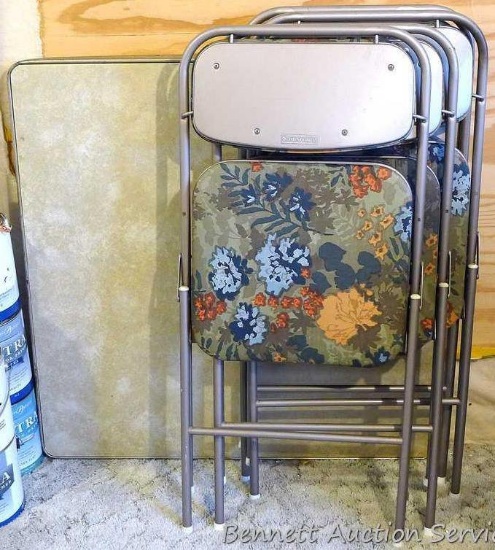 Two Samsonite folding chairs with floral upholstery. One chair seat has some spots, might clean off.