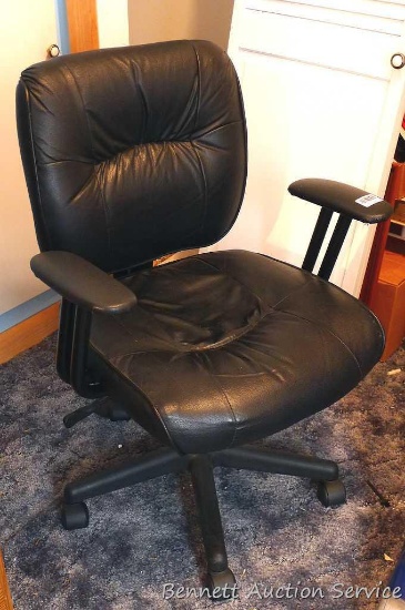 Nice padded office chair with swivel seat and on casters. Good condition and comfortable.