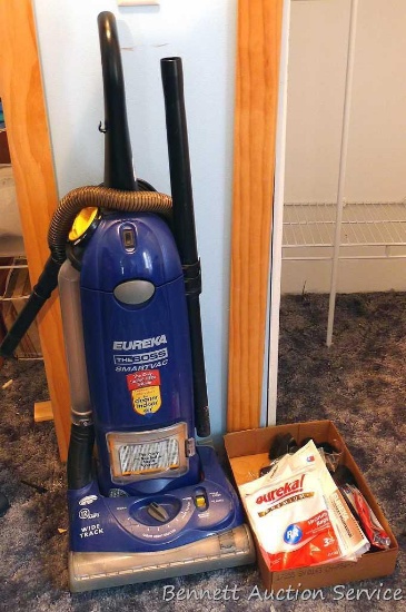 Eureka The Boss SmartVac, Model 4870; assorted accessories and bags. Vacuum works.