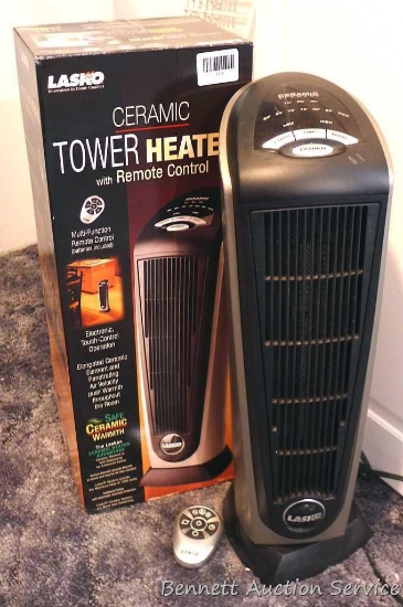 Lasko ceramic tower heater with remote control. Model 5132. 22" high. Works.