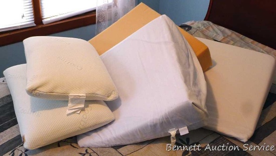 Two Sleep Harmony cooling pillows, like new; three pillow wedges, two with covers. Cooling pillows