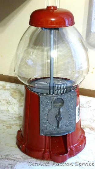 Neat bubble gum machine. Approx. 15" tall. Appears to work.