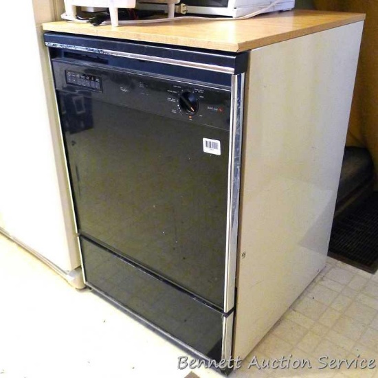 Whirlpool Quiet Wash Plus portable dishwasher, 8700 series. Has some staining inside. 24" w x