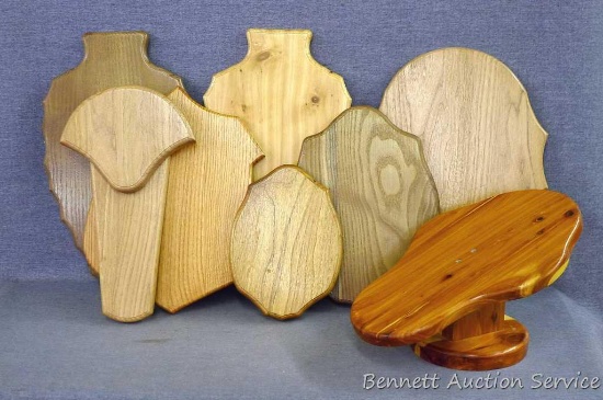 One skull mount board, six antler plaques and one turkey fan plaque. Cedar, oak, more.