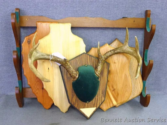 Mounted Whitetail deer antlers; four mounting boards, two are cedar; three gun rack is 24" wide by