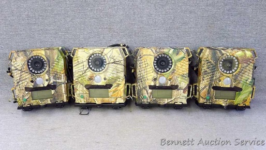 Four Wildgame N80 game cameras. Seller states that 2-3 pictures out of 10 go white on all the