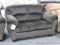 Ashley Signature love seat, Model 3340138. Love seat has brushed upholstery. Matches lot 949.