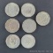 Seven Eisenhower dollars