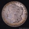1884 S Morgan silver dollar.